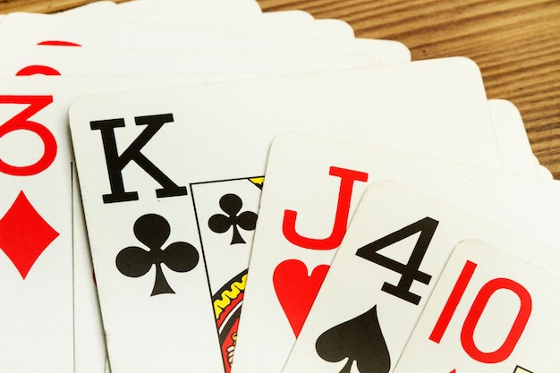 Photo poker cards on a wooden table