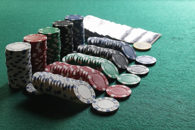 Poker chips and cards on the cloth