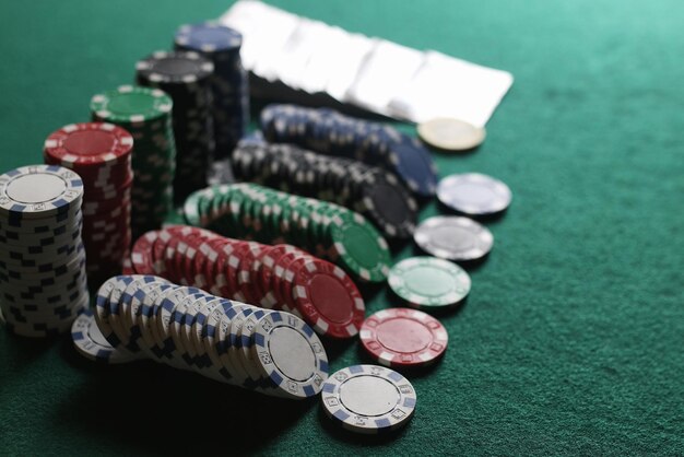 Poker chips and cards on the cloth