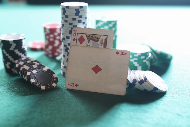 Poker chips and cards on the cloth