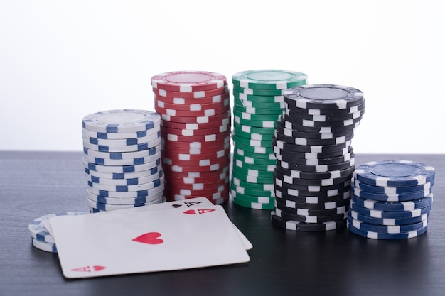 Poker chips for casino game on the table.