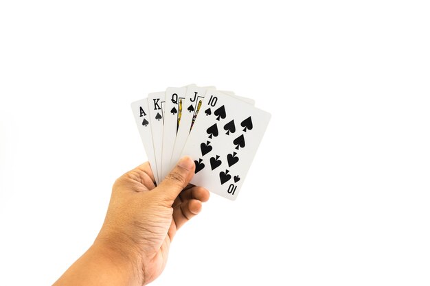 Poker spade Straigt flush in the hand of man isolated