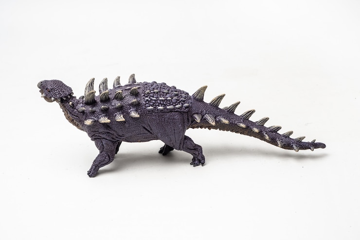 Photo 흰색 배경에 polacanthus 공룡