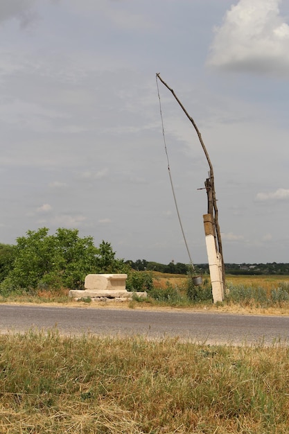 A pole with a bucket on it