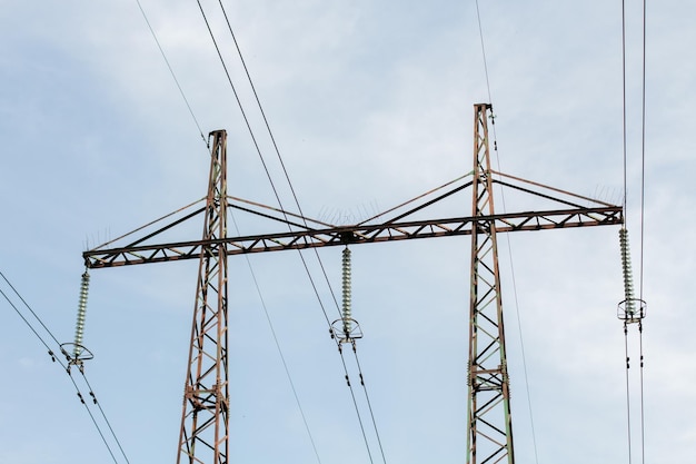 Pole with electric wires in the village