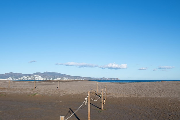 Poles joined by a rope on the beach of sant pere pescador in the gulf of roses girona catalonia spain