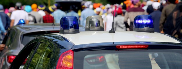 Police cars with flashing sirens during the demons