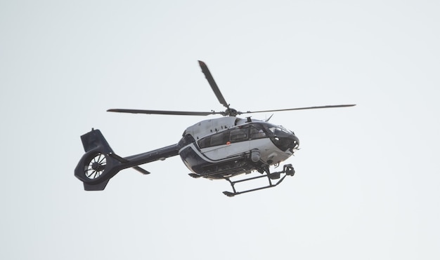 Photo police helicopter black and white. modern, equipped with the latest equipment.