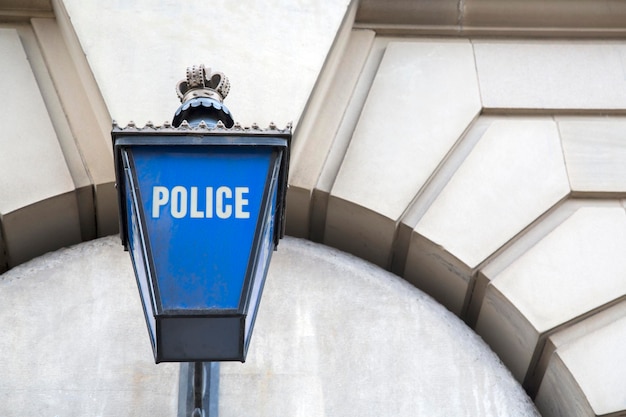 Police Station Sign on Wall