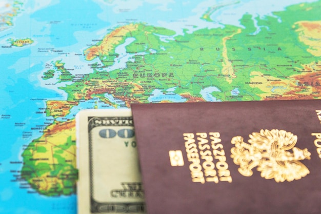 Polish biometric passport on the background of the World map The concept of visafree travel