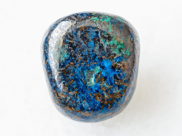 Polished Azurite gemstone on white