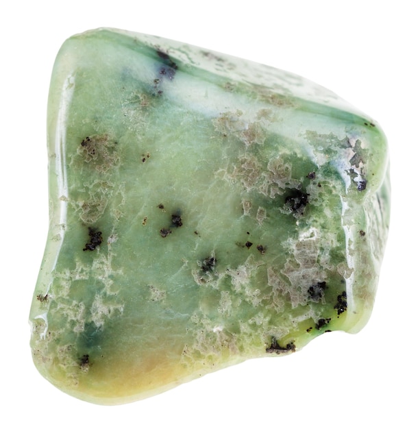 Polished green Grossular garnet gemstone isolated