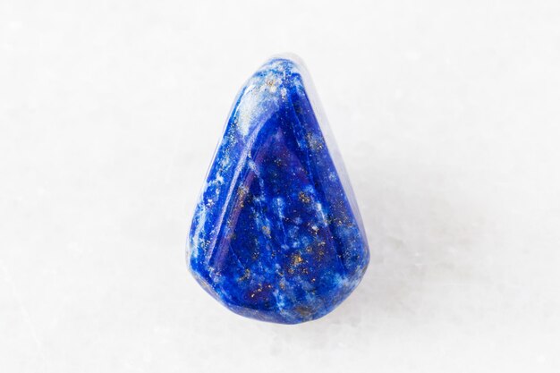 Polished Lapis Lazuli Lazurite rock on white