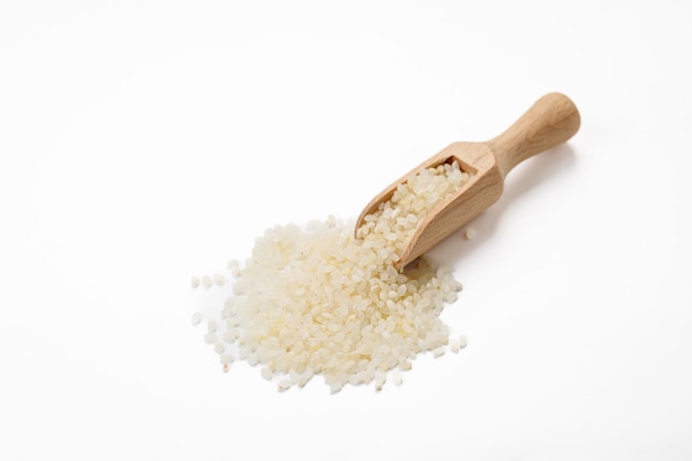 Polished round rice in bowls and bags isolated on a white background High quality photo