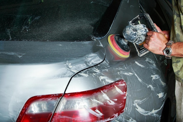 Polishing a gray car