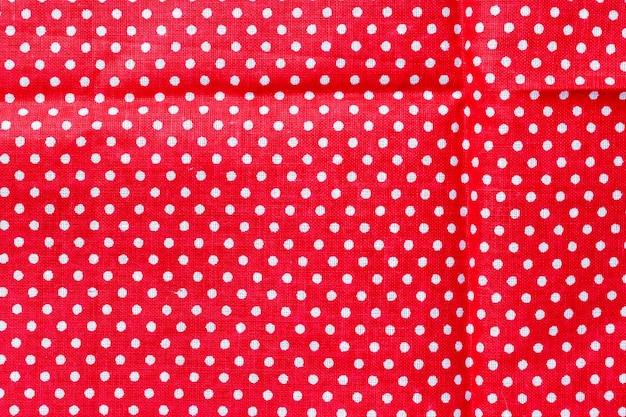 Polka dot op rode canvas katoenen textuur