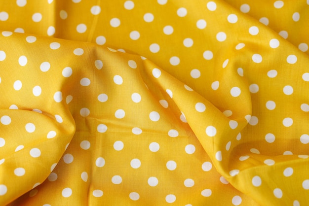 Polkadot yellow cloth Vintage yellow fabric texture Abstract geometric background