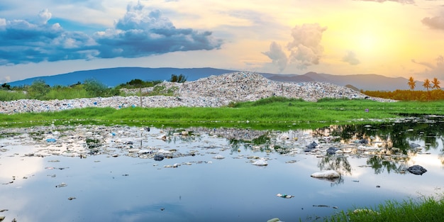 Polluted water and mountain large garbage pile and pollution These come from urban