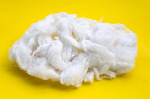 Polyester stable fiber on yellow  background