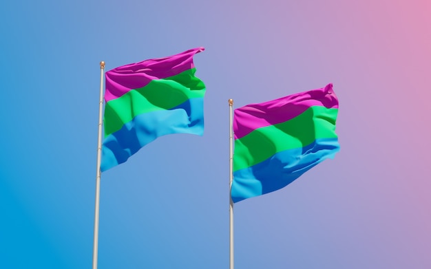 Polysexuality Pride flags on color background