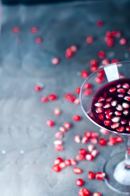 Pomegranate cocktail and ripe red fruit