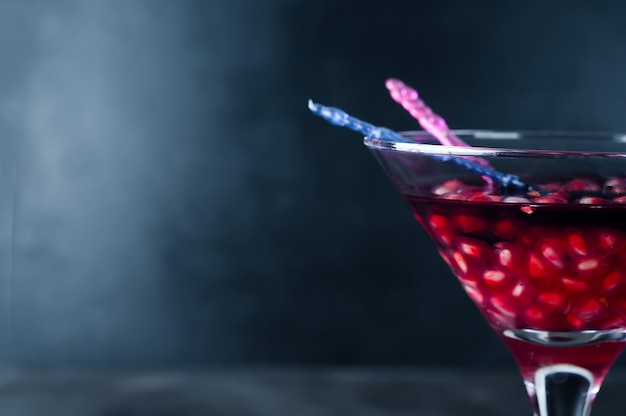 Pomegranate cocktail and ripe red fruit