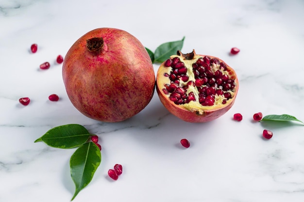 Pomegranate fruits on the stone table