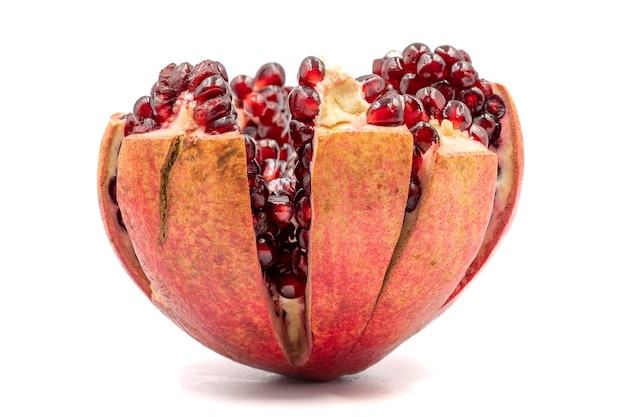 Pomegranate isolated on a white background Cut pomegranate Clipping Path Full depth of field close up