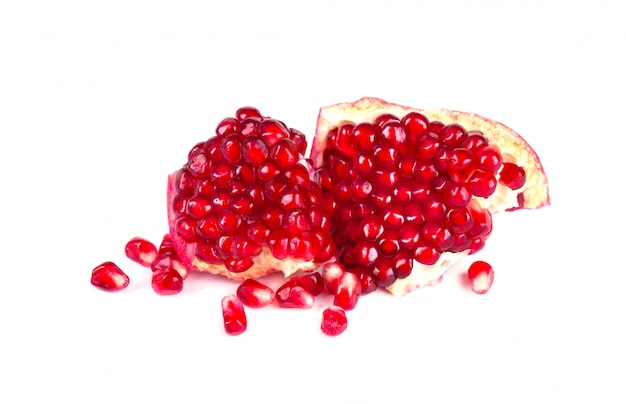 Pomegranate isolated on white space. Macro.