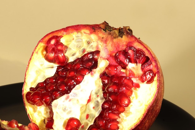 Pomegranate and seeds close up