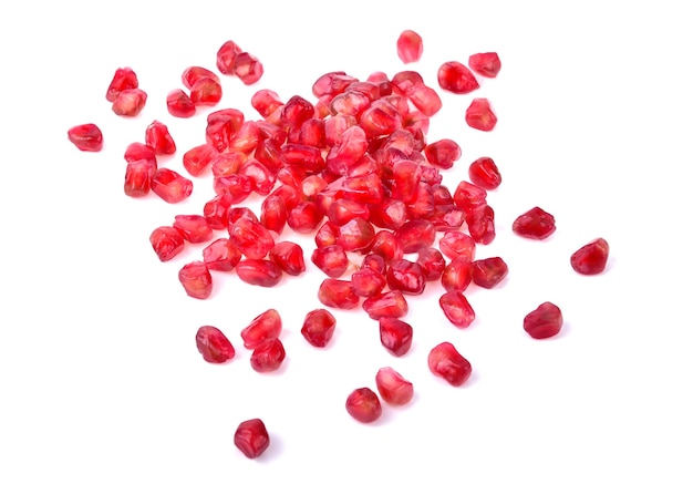 Pomegranate seeds isolated on white background