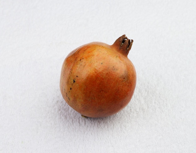 Pomegranate on a white background