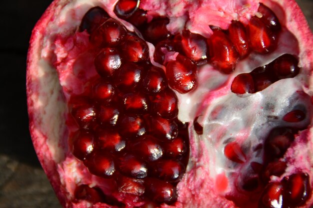 Pomegranates on a wooden table