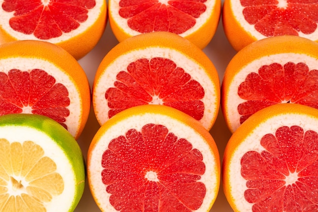 Pomelo and grapefruit slices background