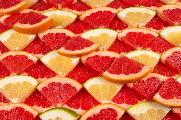 Pomelo and grapefruit slices background