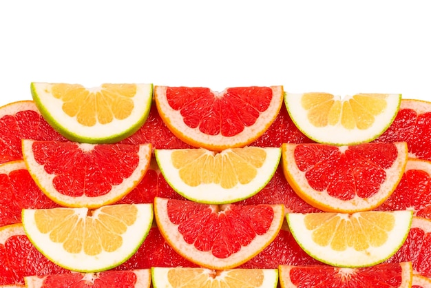 Photo pomelo and grapefruit slices background