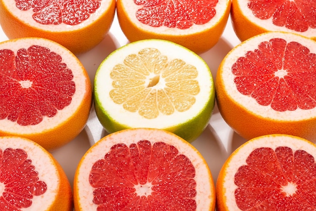 Pomelo and grapefruit slices background