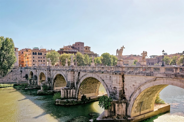 Ponte Sant Angelo Bridge over the Tiber River in Rome in Italy. It is is also called as the Bridge of Hadrian.