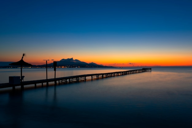 Pontoon at sunrise on playa de Muro, Mallorca, Sapin