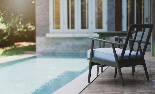 Photo pool chairs beside the pool