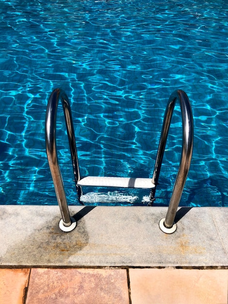 Pool ladder - crystal blue water