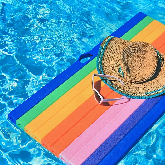 Pool and lounger with clean water summer background for traveling and vacation