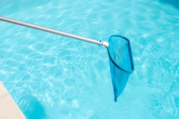 Photo pool skimmer cleaning swimming pool