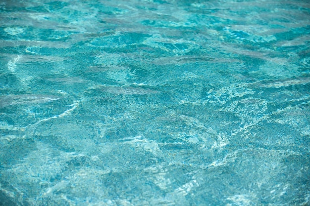 プールの水の背景 青い波 抽象的または波紋の水の質感の背景