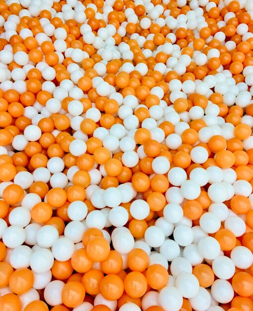 Pool of white and orange ball on kids playground