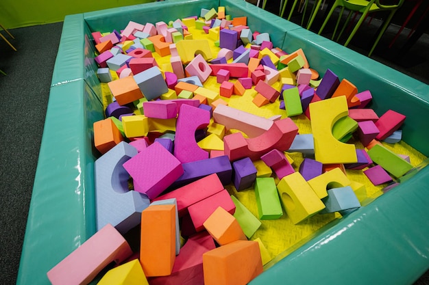 Pool with different geometric shapes at indoor play center playground