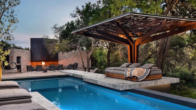 a pool with a fire place and a fire place with a fire place in the background