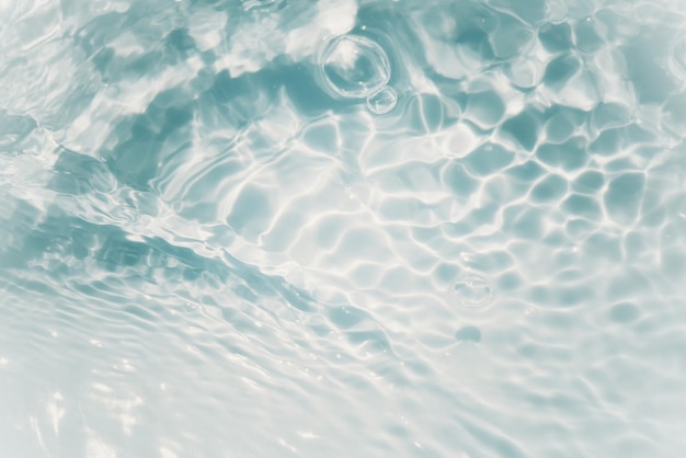 A pool with water and the sun shining on it