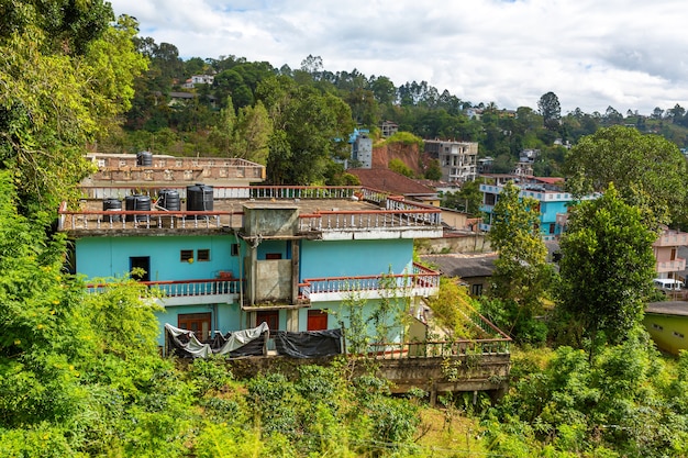 Poor dilapidated houses of the inhabitants of the island of Sri Lanka. Jungle lodging.