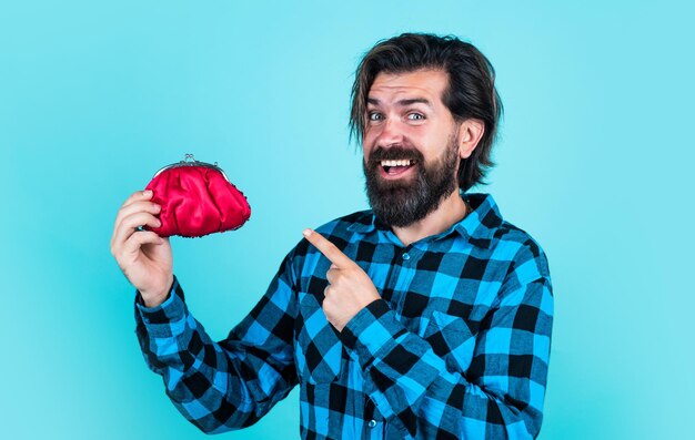 Poor man need some money loan in crises have money saving ready to go shopping bearded hipster in checkered shirt with wallet concept of finance and economy unhappy man hold purse look at that